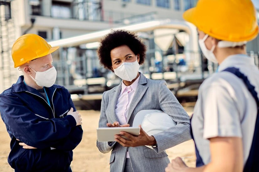 African american building contractor talking civil engineers construction site coronavirus epidemic 8170