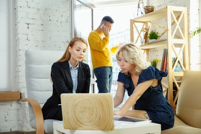 Interior designer working with young couple 29460 1